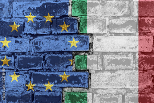 The flag of the European Union and Italy on a brick wall