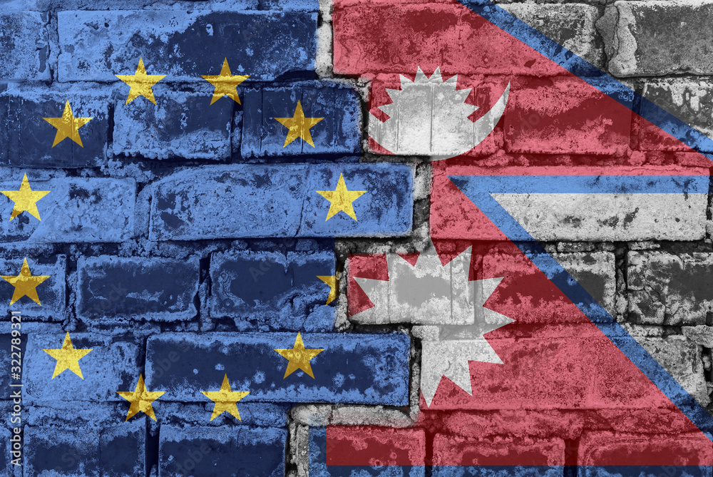 Naklejka premium The flag of the European Union and Nepal on a brick wall