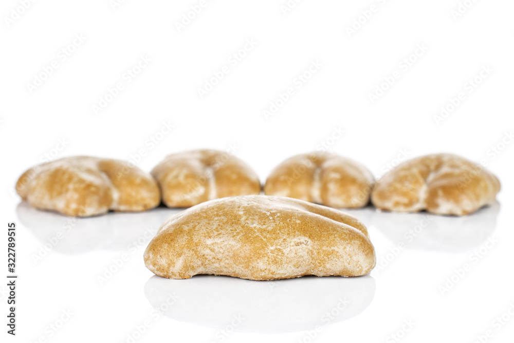 Group of five whole sweet brown gingerbread isolated on white background