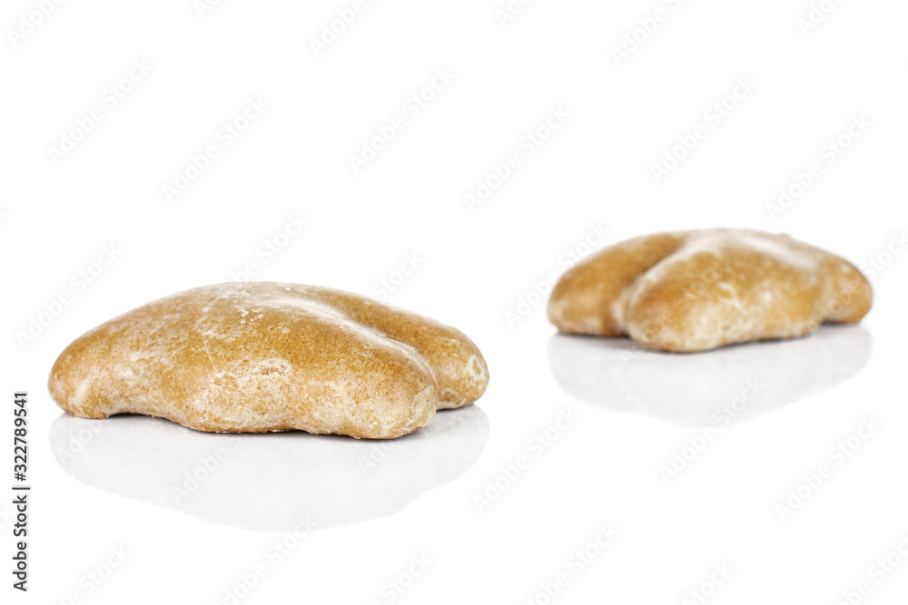 Group of two whole sweet brown gingerbread isolated on white background Group of two whole sweet brown gingerbread isolated on white background