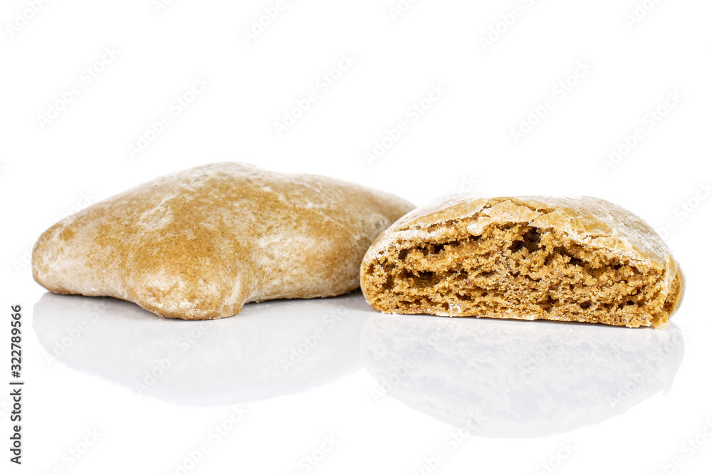 Group of one whole one half of sweet brown gingerbread isolated on white background