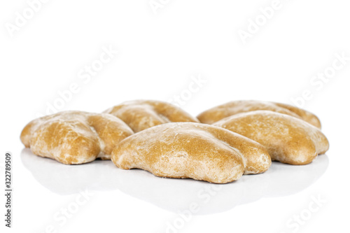 Group of five whole sweet brown gingerbread isolated on white background