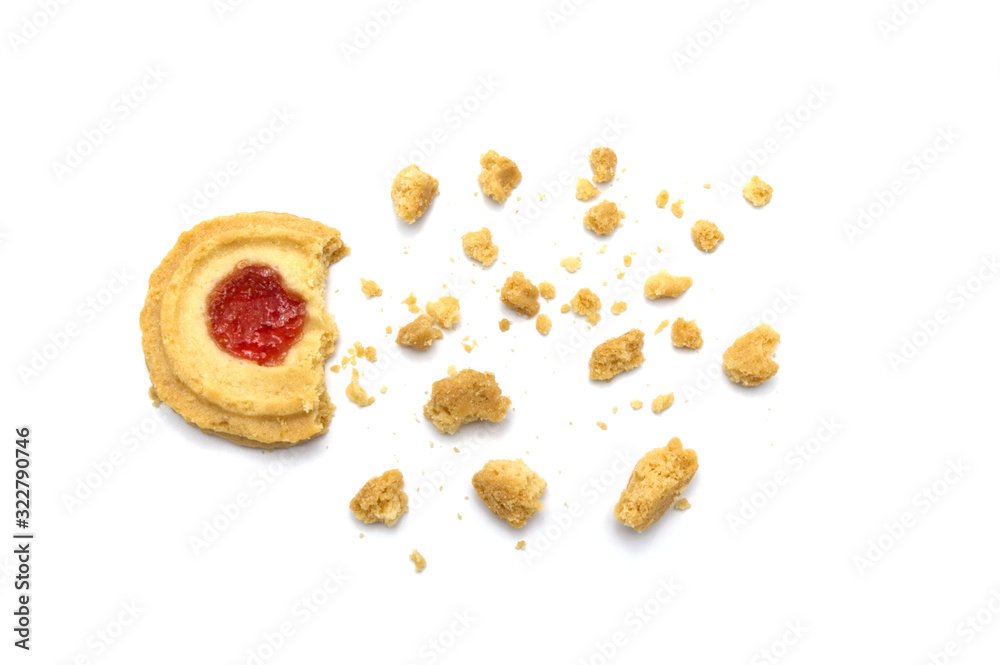 Butter cookies strawberry jam topping flavored. Some cracks and crumbs. Crunchy delicious sweet meal and useful biscuits on white background. Butter cookies strawberry jam topping flavored. Some cracks and crumbs. Crunchy delicious sweet meal and useful biscuits on white background.