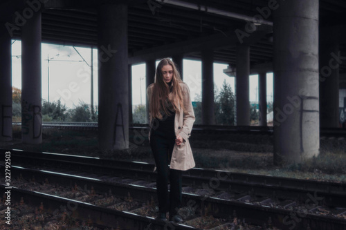 young woman in white coat