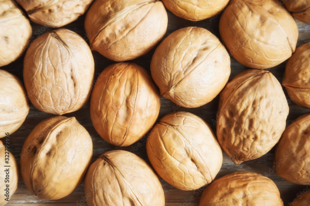 Walnut. proper nutrition, nut in the shell. background for design. background, screen saver. photo of food. Walnut. proper nutrition, nut in the shell. background for design. background, screen saver. photo of food.
