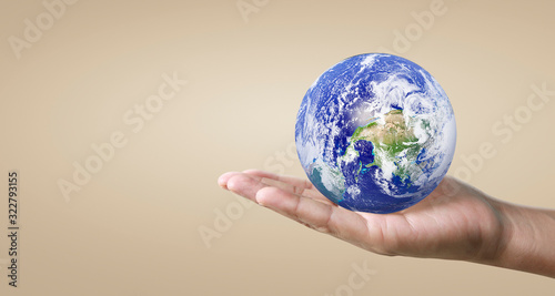 Globe  earth in human hand. Earth image provided by Nasa