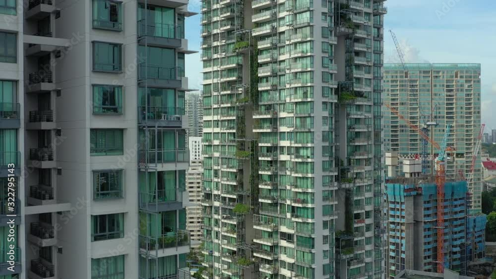 sunny evening singapore city center apartment complex front aerial panorama 4k sunny evening singapore city center apartment complex front aerial panorama 4k