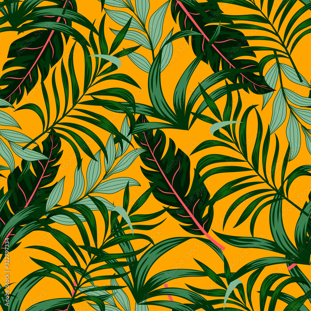 Seamless tropical pattern with green plants and leaves on a colorful yellow background. Hand draw texture. Vector template. Seamless exotic pattern with tropical plants. Hawaiian style.