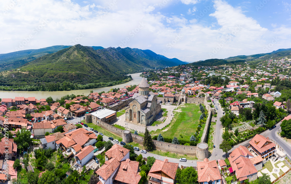 Panoramic view of Mtskheta, The Old Town Lies At The Confluence Of The Rivers Mtkvari And Aragvi. Svetitskhoveli Cathedral, Ancient Georgian Orthodox Church, Unesco Heritage In The Center