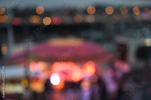 Blurred background with bokeh of a night city with lights.