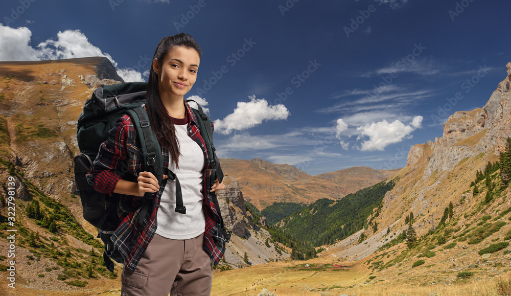 Young female hiker on a mountain Young female hiker on a mountain