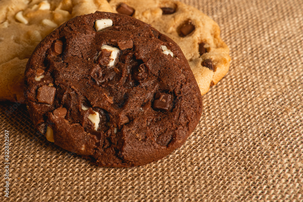 Fototapeta premium chocolate cookies on sackcloth