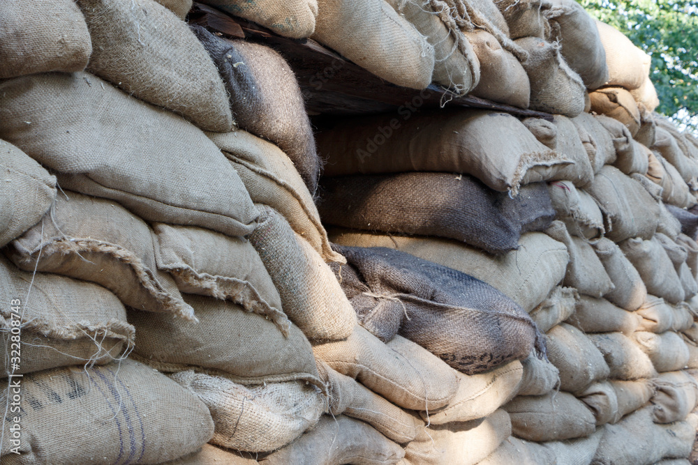 Obraz premium Military fortification of sandbags with loopholes.