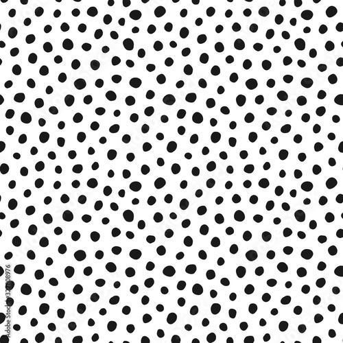 Seamless pattern of dots of arbitrary shape. Abstract minimalistic pattern for different uses
