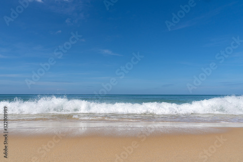 Ocean view and white sand beach with a white wave background