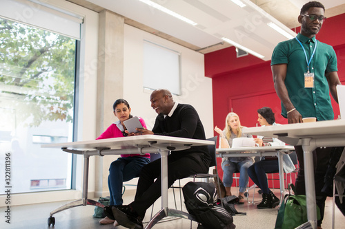 Wallpaper Mural Community college students using digital tablet in classroom Torontodigital.ca