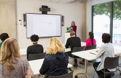 Female community college instructor leading lesson