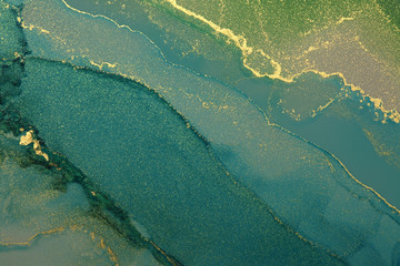 Abstract paint green wave blots background. Alcohol ink colors. Marble texture.