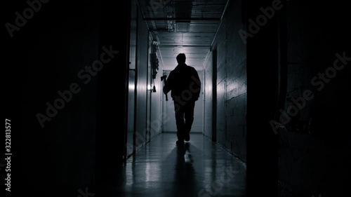 Ax Murderer Walking Down Creepy Hallway