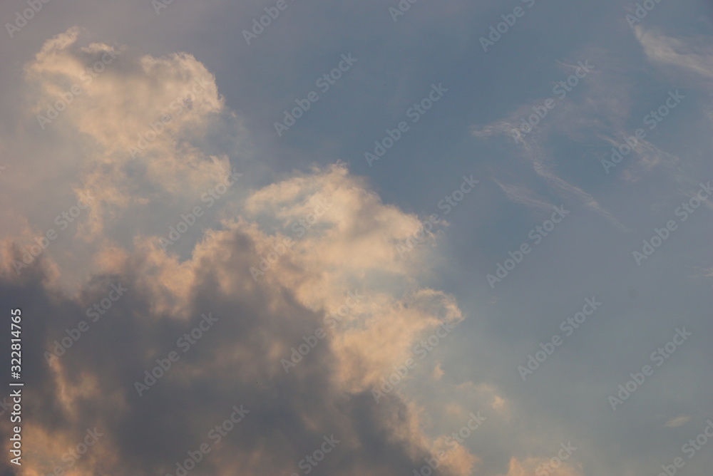 The blue sky and he white and greyish clouds The blue sky and he white and greyish clouds