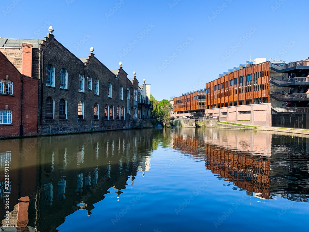 Traditional architecture reflected in water canal in Camden Town, London Traditional architecture reflected in water canal in Camden Town, London