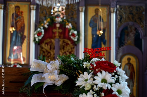 a flower arrangement at the church for Christmas