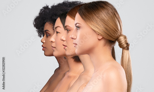 Beautiful multiethnic women standing in row photo
