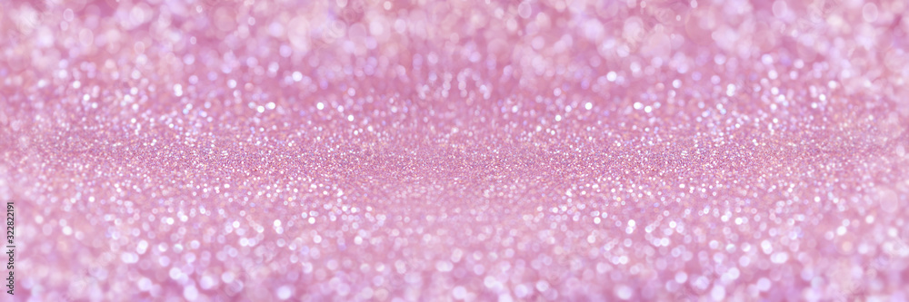 Abstract sparkle glitter lights background. Selective focus.  Pastel pink color. Shine bokeh effect. For party, holidays, celebration. Banner for website. 