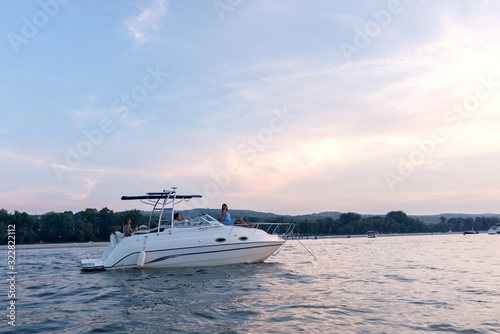 Boat in a summer sunset © Jovan