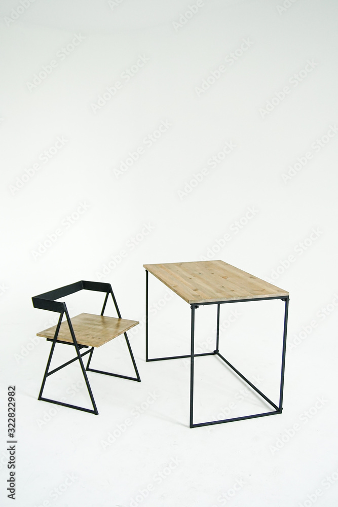 Deconstructivism chair and table in cyclorama on a white background