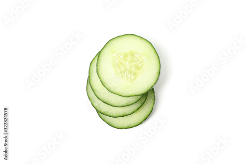 Green cucumber slices isolated on white background