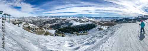 Panoramic view of Wasatch mountains at Deer Valley ski resort from near the top of Empire lift. photo