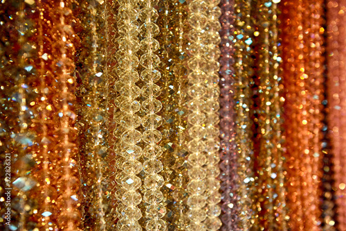 Hanging cheap glass necklaces, close-up view