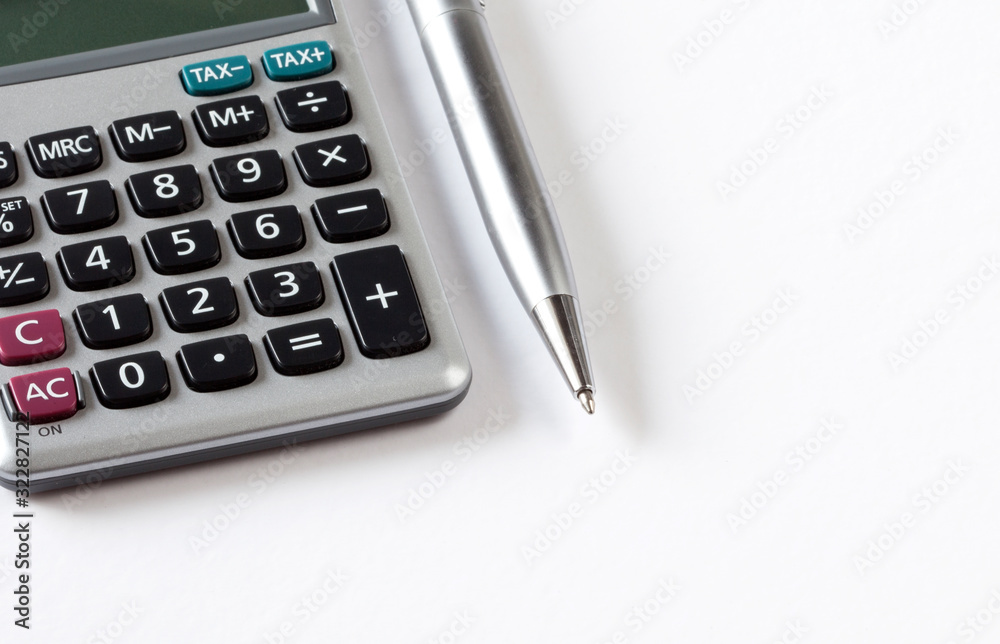 calculator and pen isolated on white background calculator and pen isolated on white background