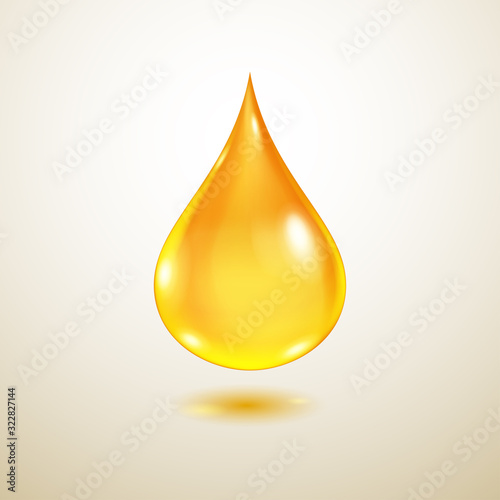 One big realistic translucent water drop in yellow colors with shadow