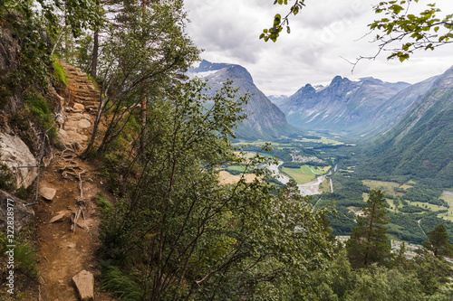 AANDALSNES, NORWAY - 2018 AUGUST 02. Hiking path replaced with steel steps with great view over the valley photo