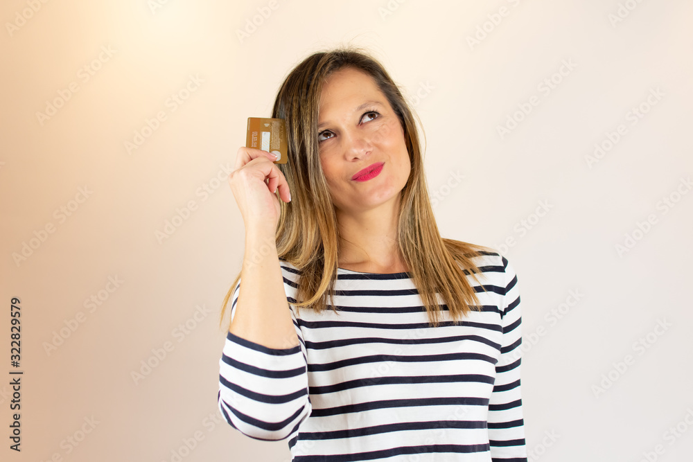 Young woman with credit card in her hand Young woman with credit card in her hand