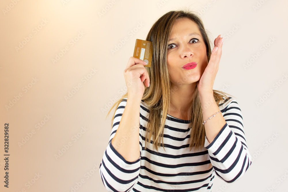 Young woman with credit card in her hand Young woman with credit card in her hand