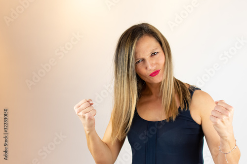 Young woman making a gesture with her arms