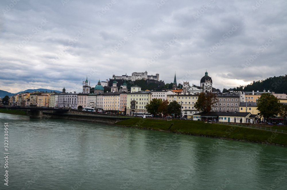 Beautiful view of Salzburg skyline with Festung Hohensalzburg and Salzach river in autumn, Salzburg, Salzburger Land, Austria.