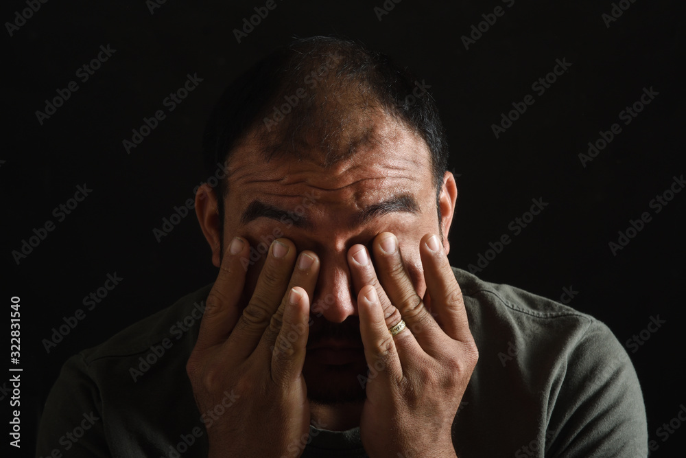 latin american man tired and fatigued latin american man tired and fatigued