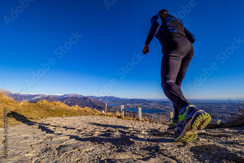 Hiker in the alps at sunset