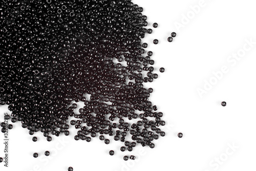 Scattering of colored beads on a white background