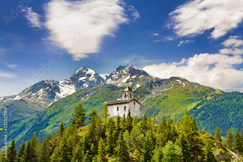 Chapelle Saint-Michel on a Hilltop in Montvalezan, France photo