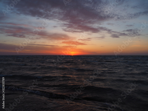 The moment of sunrise at sea © Taras