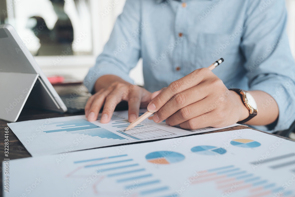 Businessman analyse investment marketing data. Businessman analyse investment marketing data.