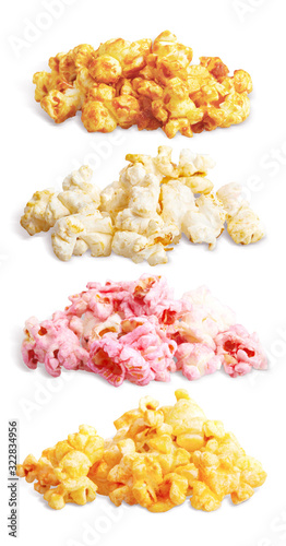 Set of heaps with different popcorn flavors (cherry, caramel, salted, cheese or bacon tastes), close up, isolated on white background with clipping path. Ready-to-eat snacks for a movie wathcing. 