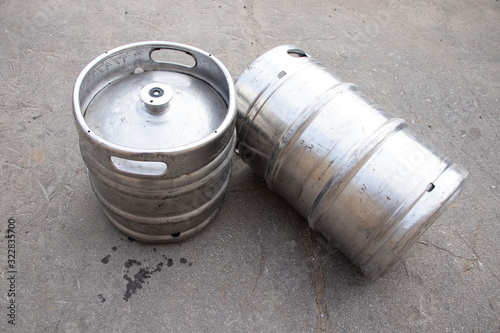 Beer kegs 50 liters. Warehouse. Indoors and outdoors. Silver colour.