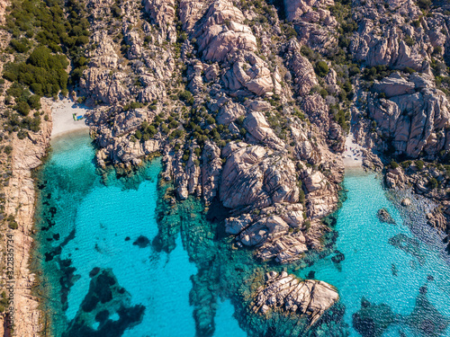 Aerial view of the coast of Cala Coticcio, one of the most Beautiful beaches in the world, Island of La Maddalena, Sardinia. © Alien