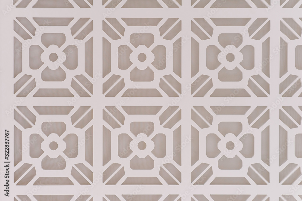Decorative graphic background with flowers. Pattern of white flowers on a gray background. Abstract luxurious background beige. Texture paint pattern can used for wallpaper or wall tile.